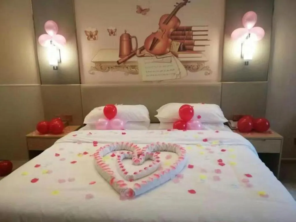 Bed in Vienna Hotel Anhui Taihe Baitai Xingma International