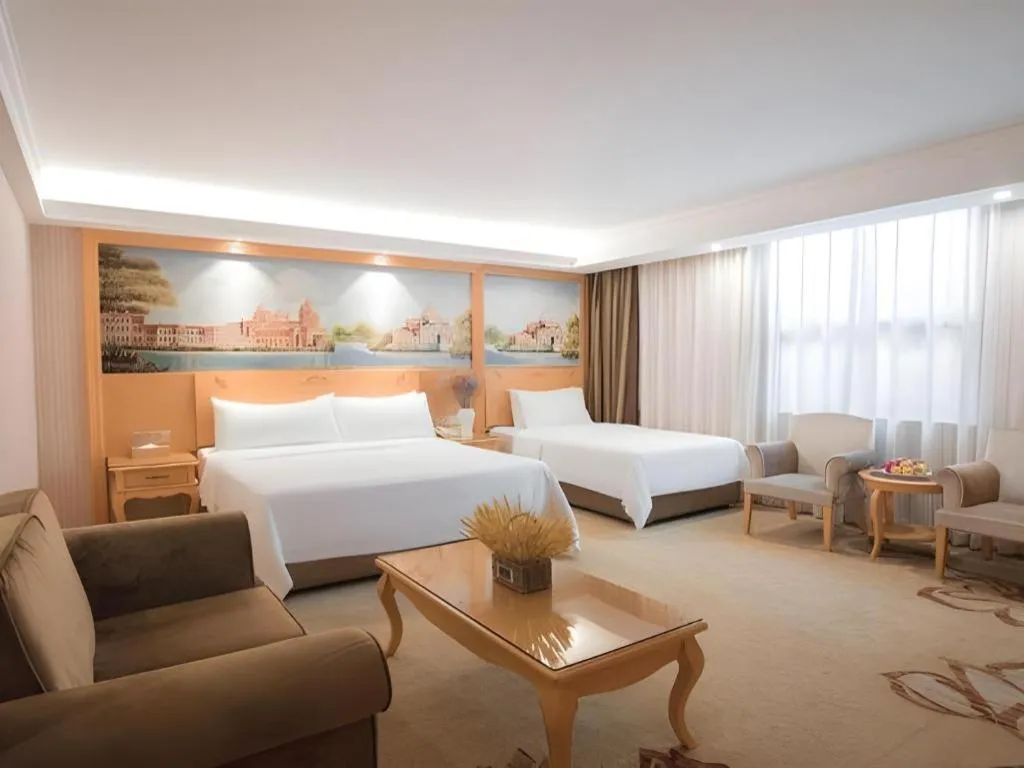 Bed in Vienna Hotel Guangdong Boluo Fu Mountain Scenic Spot