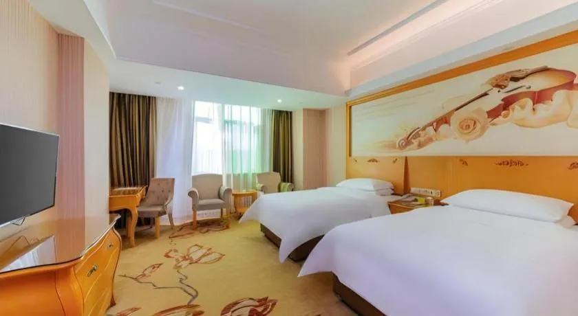 Bed in Vienna Hotel Guangdong Boluo Fu Mountain Scenic Spot