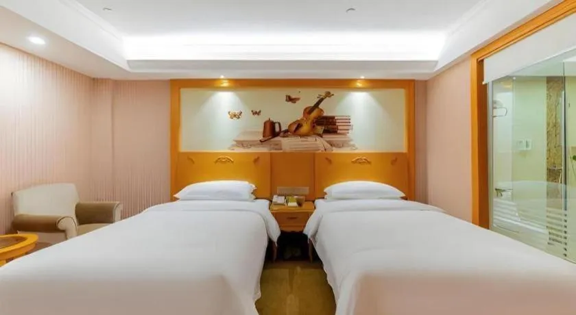 Bed in Vienna Hotel Guangdong Boluo Fu Mountain Scenic Spot