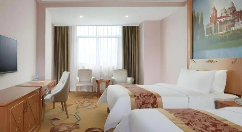 Bed in Vienna Hotel Guangdong Boluo Fu Mountain Scenic Spot