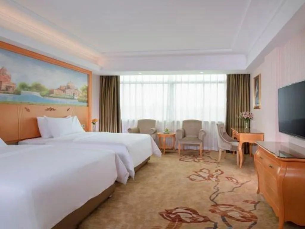 Bed in Vienna Hotel Guangdong Boluo Fu Mountain Scenic Spot