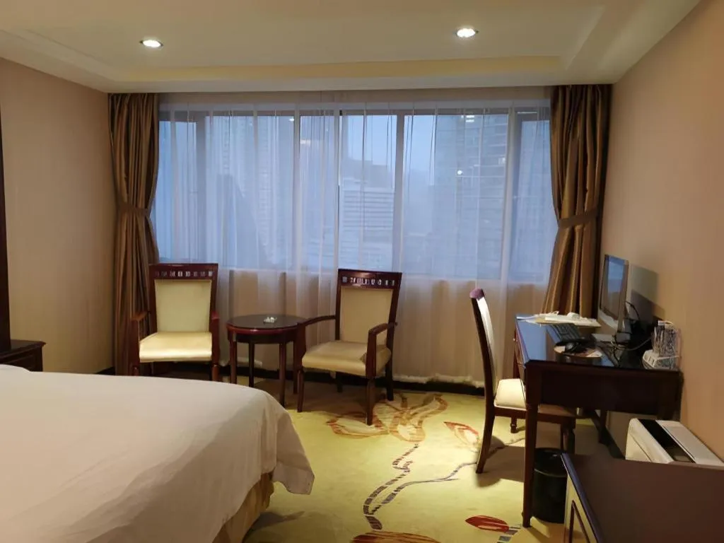 Bed in Vienna Hotel Guangdong Boluo Fu Mountain Scenic Spot