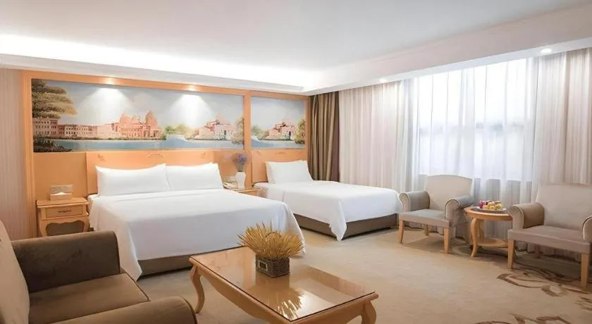 Bed in Vienna Hotel Guangdong Boluo Fu Mountain Scenic Spot