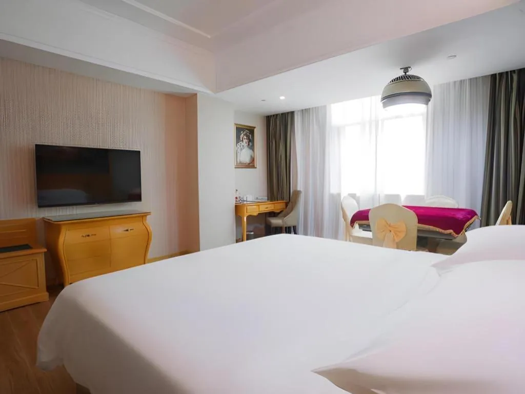 Bed in Vienna Hotel Guangdong Boluo Fu Mountain Scenic Spot