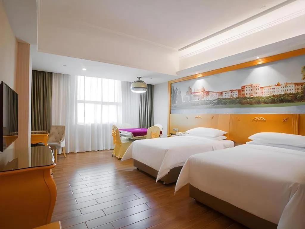 Bed in Vienna Hotel Guangdong Boluo Fu Mountain Scenic Spot