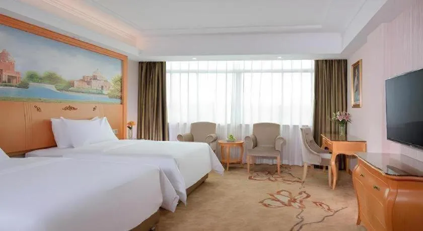 Bed in Vienna Hotel Guangdong Boluo Fu Mountain Scenic Spot