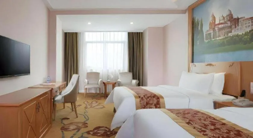 Bed in Vienna Hotel Guangdong Boluo Fu Mountain Scenic Spot