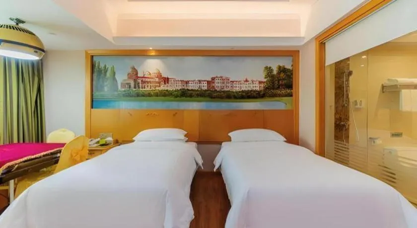Bed in Vienna Hotel Guangdong Boluo Fu Mountain Scenic Spot