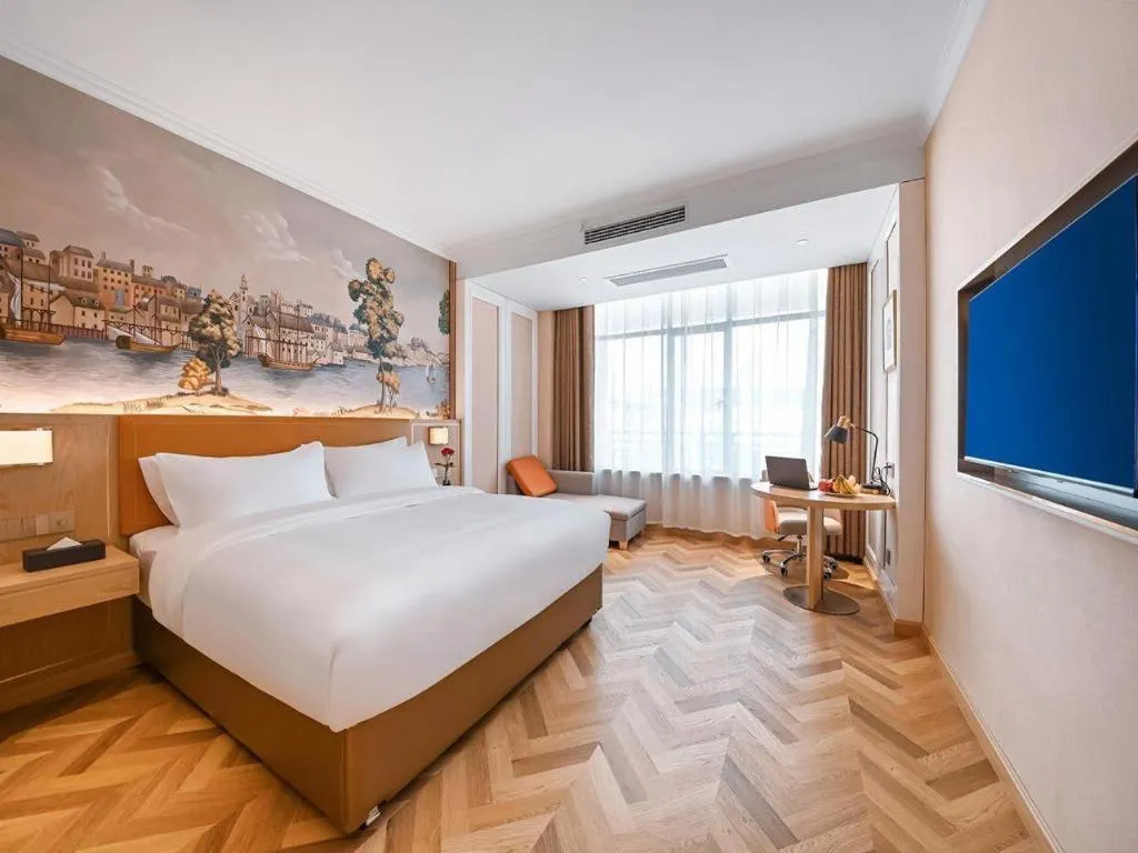 Bed in Vienna Hotel Jiangxi Ganzhou Ningdu Bus Station