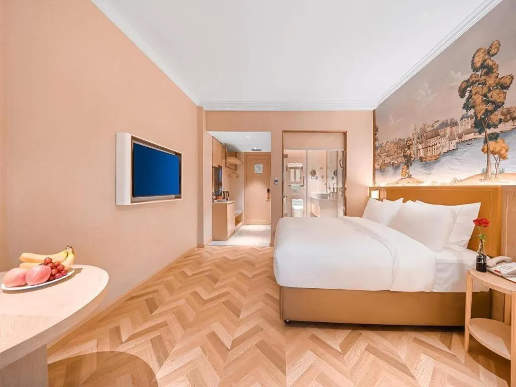 Bed in Vienna Hotel Jiangxi Ganzhou Ningdu Bus Station