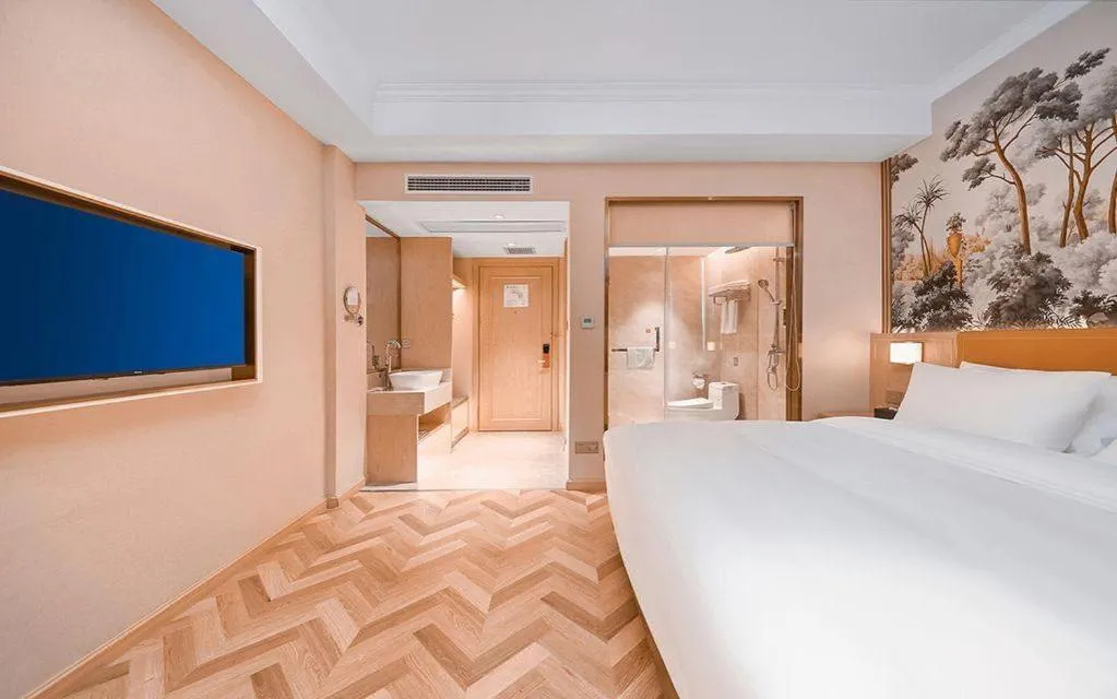 Bed in Vienna Hotel Jiangxi Ganzhou Ningdu Bus Station