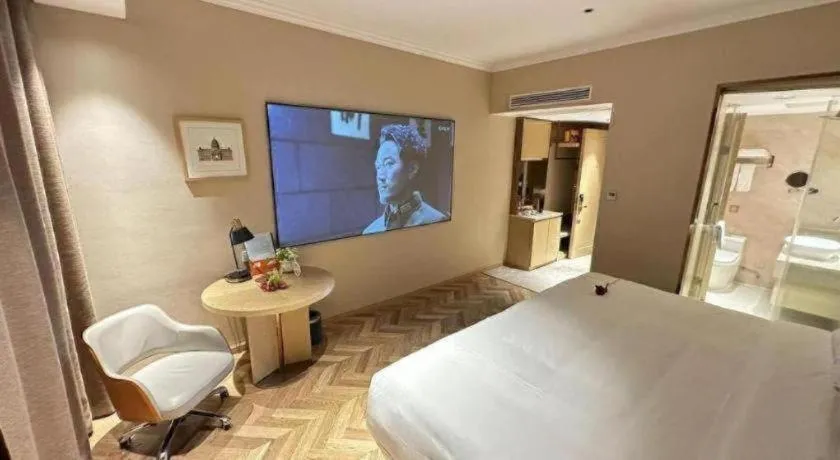 Bed in Vienna Hotel Jiangxi Ganzhou Ningdu Bus Station