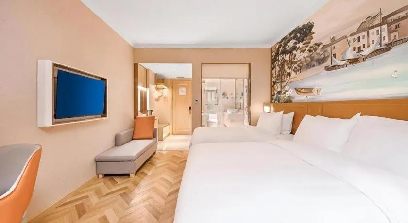 Bed in Vienna Hotel Jiangxi Ganzhou Ningdu Bus Station