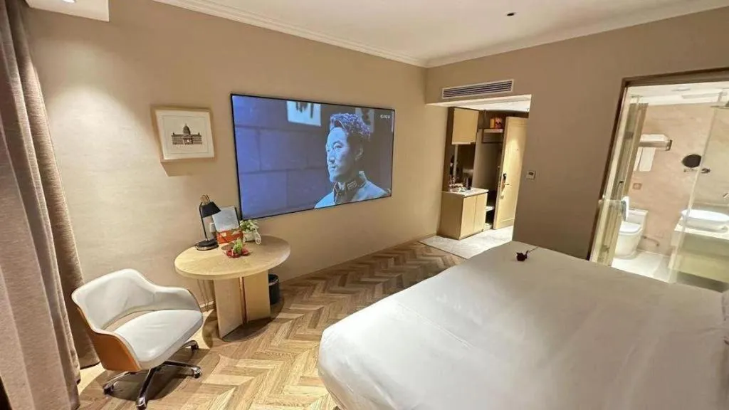 Bed in Vienna Hotel Jiangxi Ganzhou Ningdu Bus Station