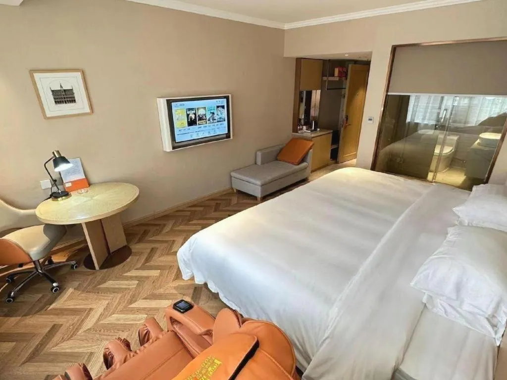 Bed in Vienna Hotel Jiangxi Ganzhou Ningdu Bus Station