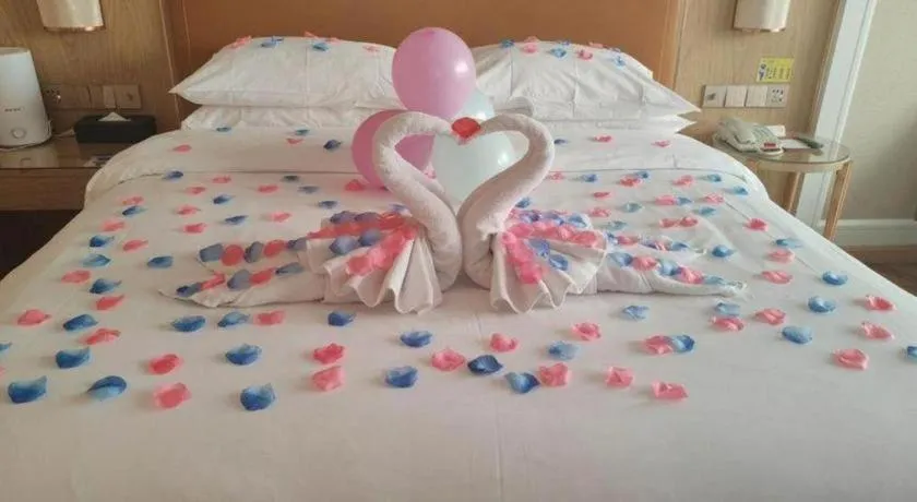 Bed in Vienna Hotel Jiangxi Ganzhou Ningdu Bus Station