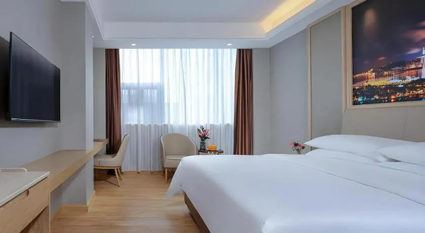 Bed in Vienna Hotel Zhuhai Huafashangdu Nanping Science Industrial Park