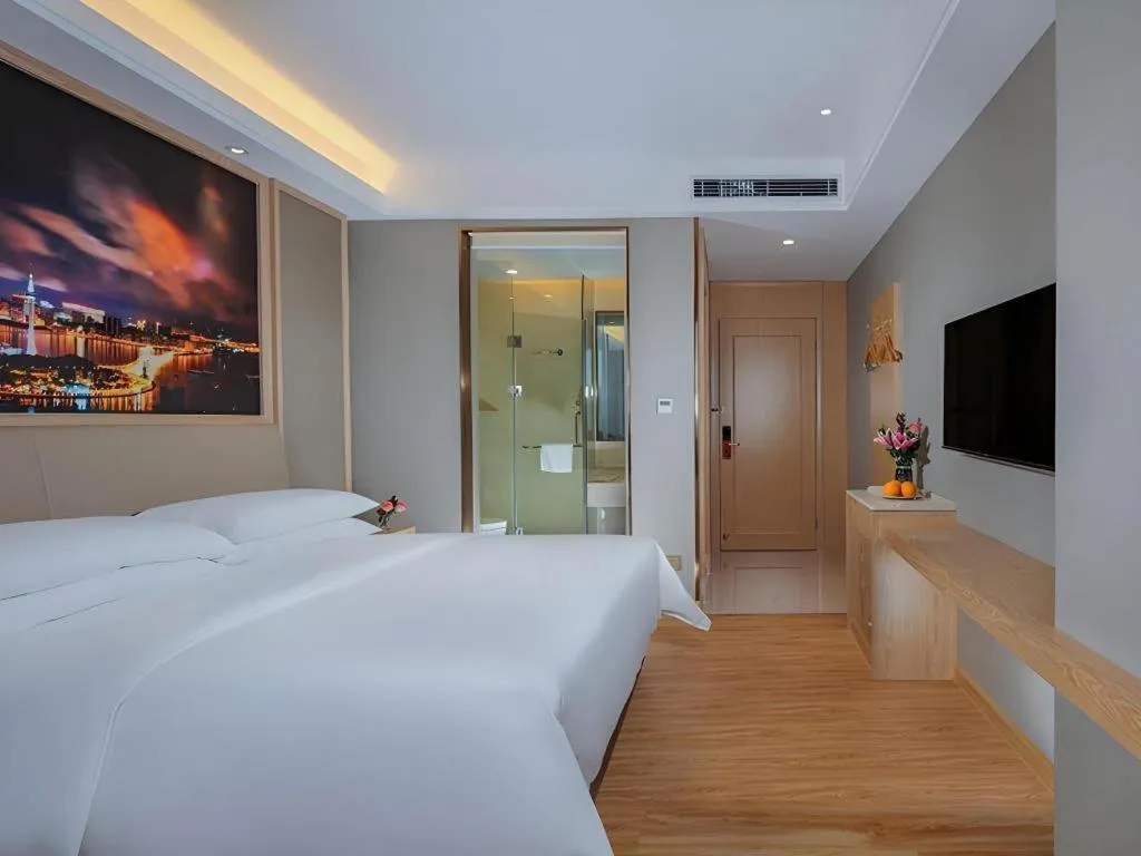 Bed in Vienna Hotel Zhuhai Huafashangdu Nanping Science Industrial Park