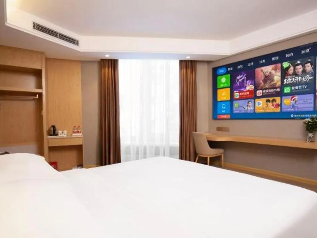 Bed in Vienna Hotel Zhuhai Huafashangdu Nanping Science Industrial Park