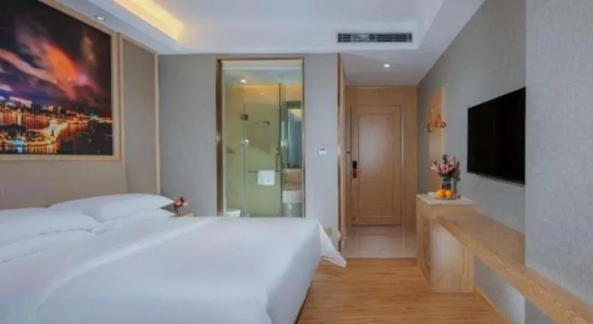 Bed in Vienna Hotel Zhuhai Huafashangdu Nanping Science Industrial Park