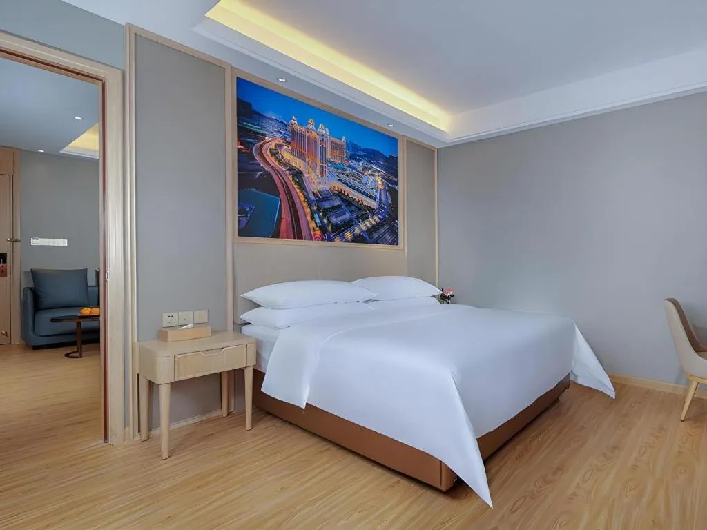 Bed in Vienna Hotel Zhuhai Huafashangdu Nanping Science Industrial Park