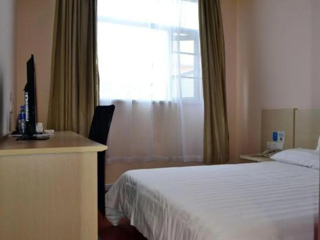 Bed in Vienna Hotel Zhuhai Huafashangdu Nanping Science Industrial Park