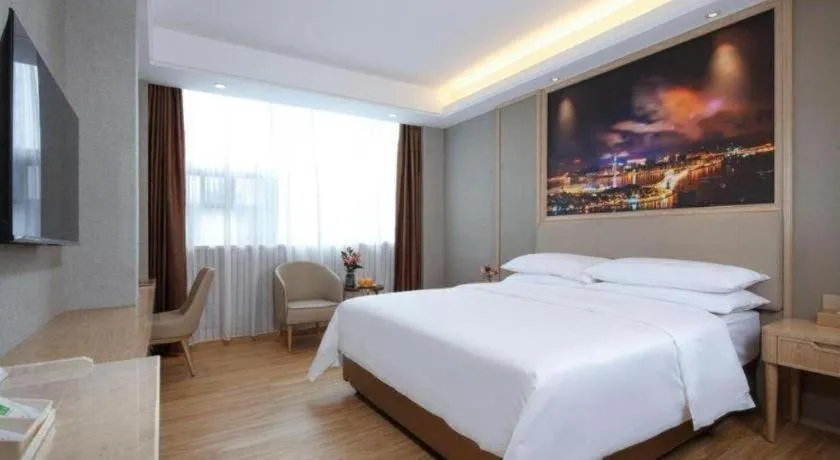 Bed in Vienna Hotel Zhuhai Huafashangdu Nanping Science Industrial Park