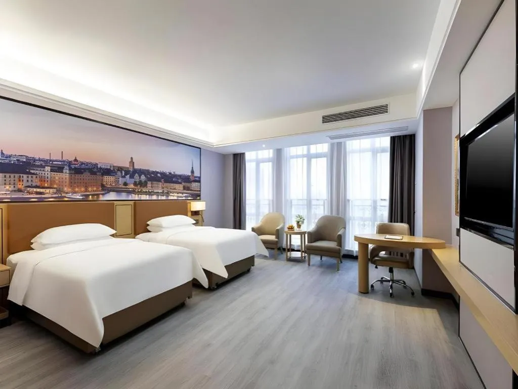 Bed in Vienna Hotel Jiangxi Shangrao High-Speed Railway Station