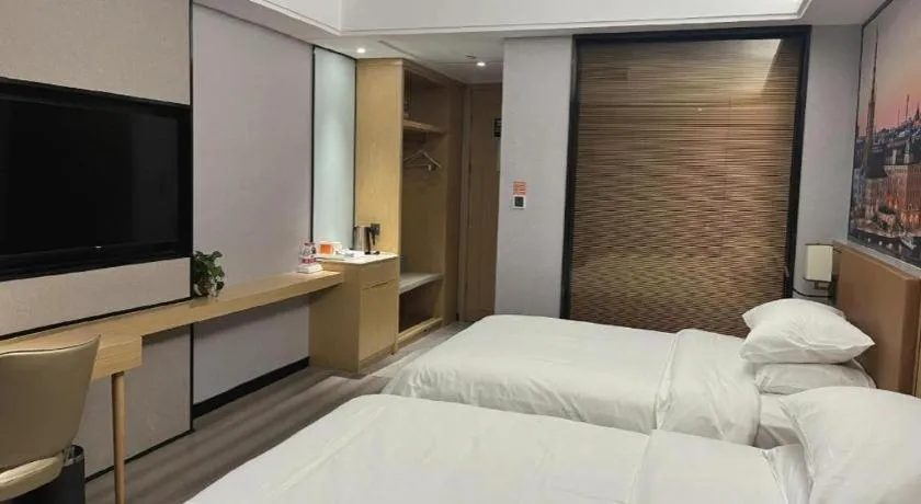 Bed in Vienna Hotel Jiangxi Shangrao High-Speed Railway Station