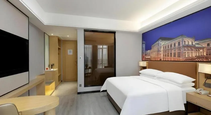 Bed in Vienna Hotel Jiangxi Shangrao High-Speed Railway Station