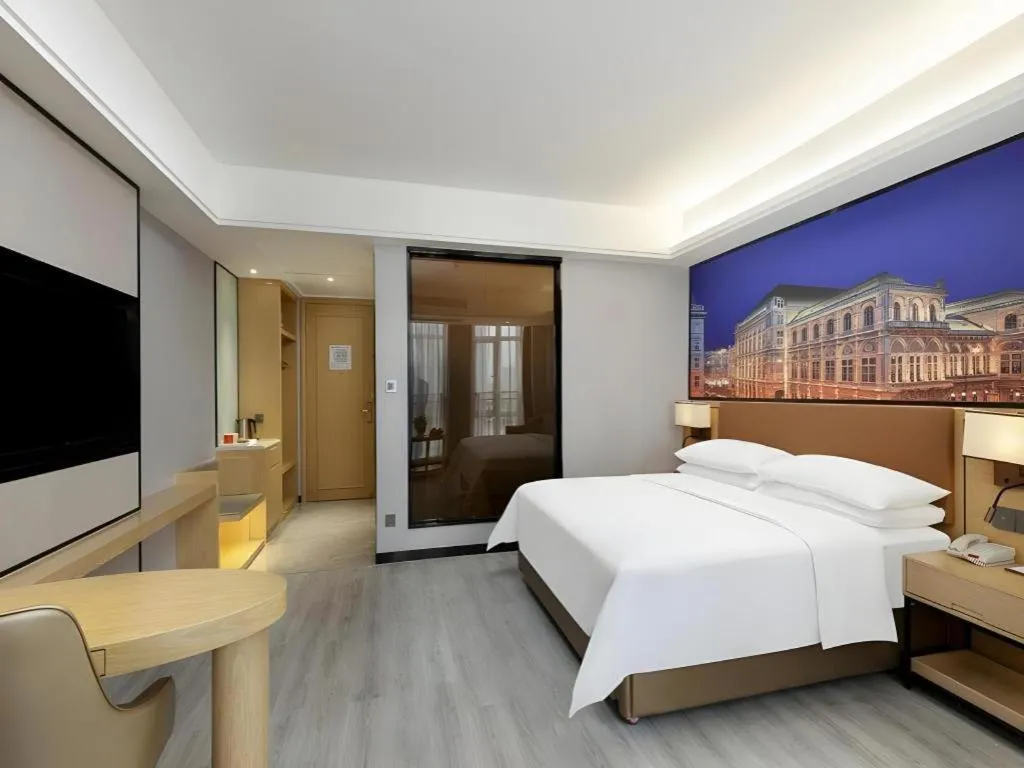 Bed in Vienna Hotel Jiangxi Shangrao High-Speed Railway Station
