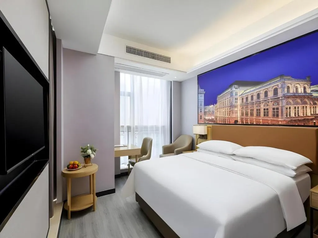 Bed in Vienna Hotel Jiangxi Shangrao High-Speed Railway Station
