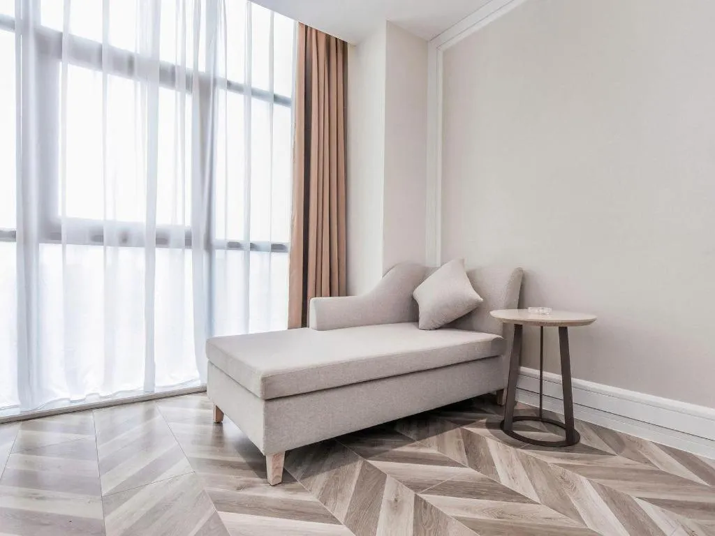 Bed in Vienna Hotel Sichuan Hejiang Yangtze River Bridge