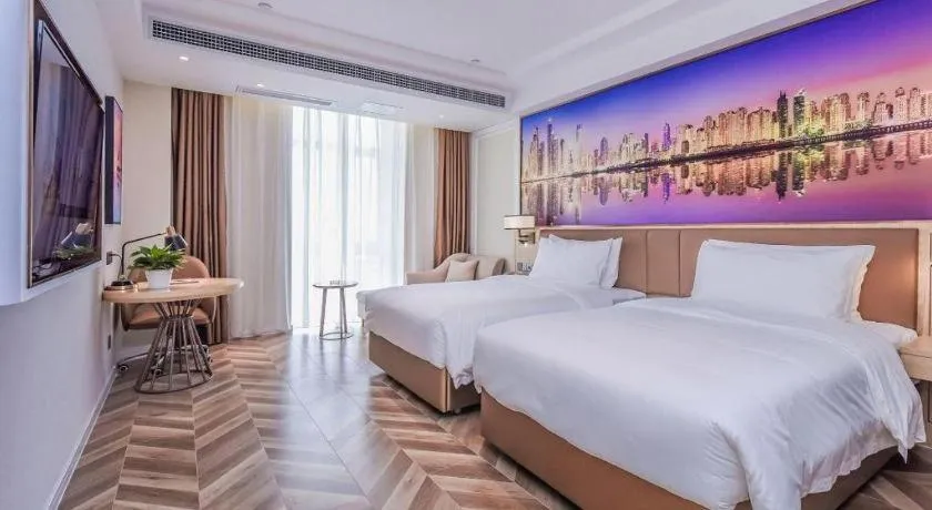 Bed in Vienna Hotel Sichuan Hejiang Yangtze River Bridge