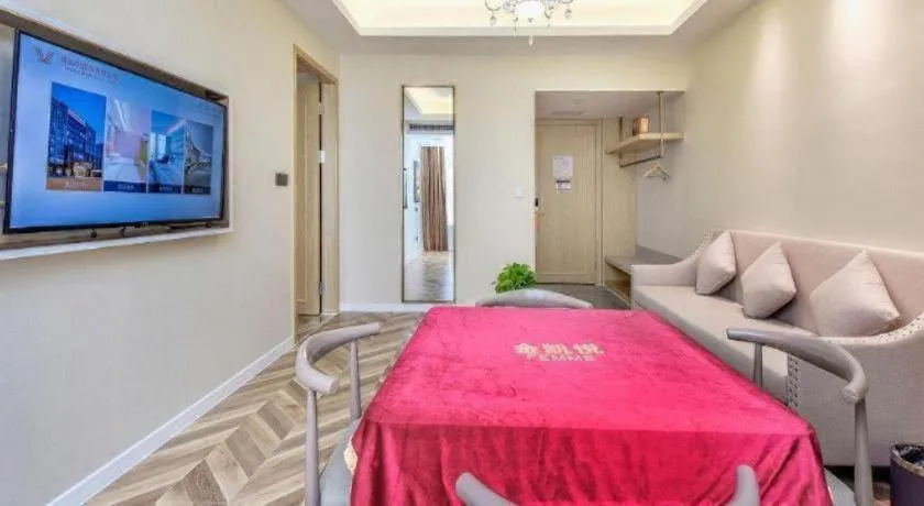 Bed in Vienna Hotel Sichuan Hejiang Yangtze River Bridge