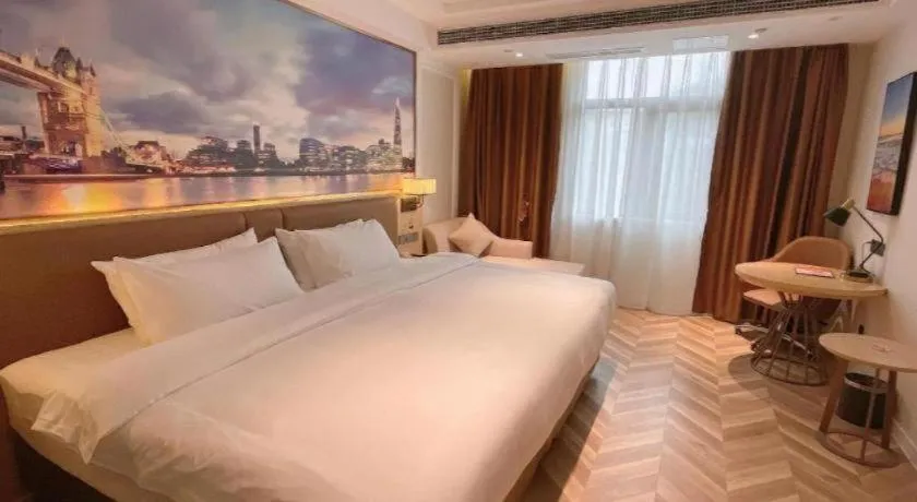 Bed in Vienna Hotel Sichuan Hejiang Yangtze River Bridge