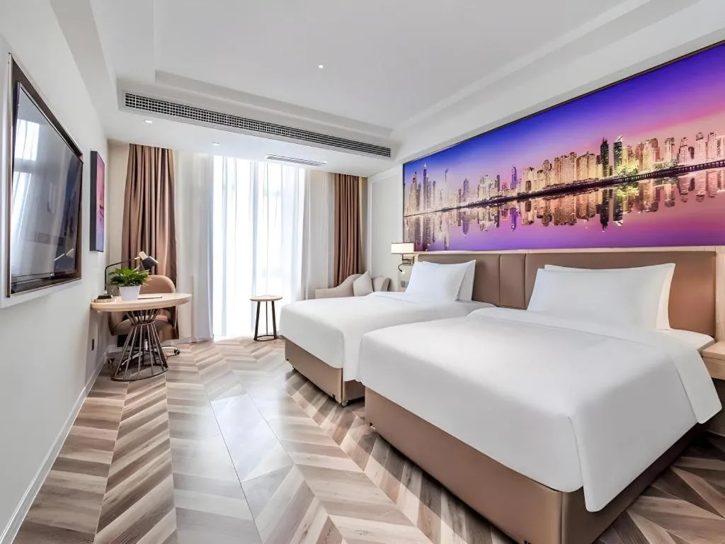 Bed in Vienna Hotel Sichuan Hejiang Yangtze River Bridge