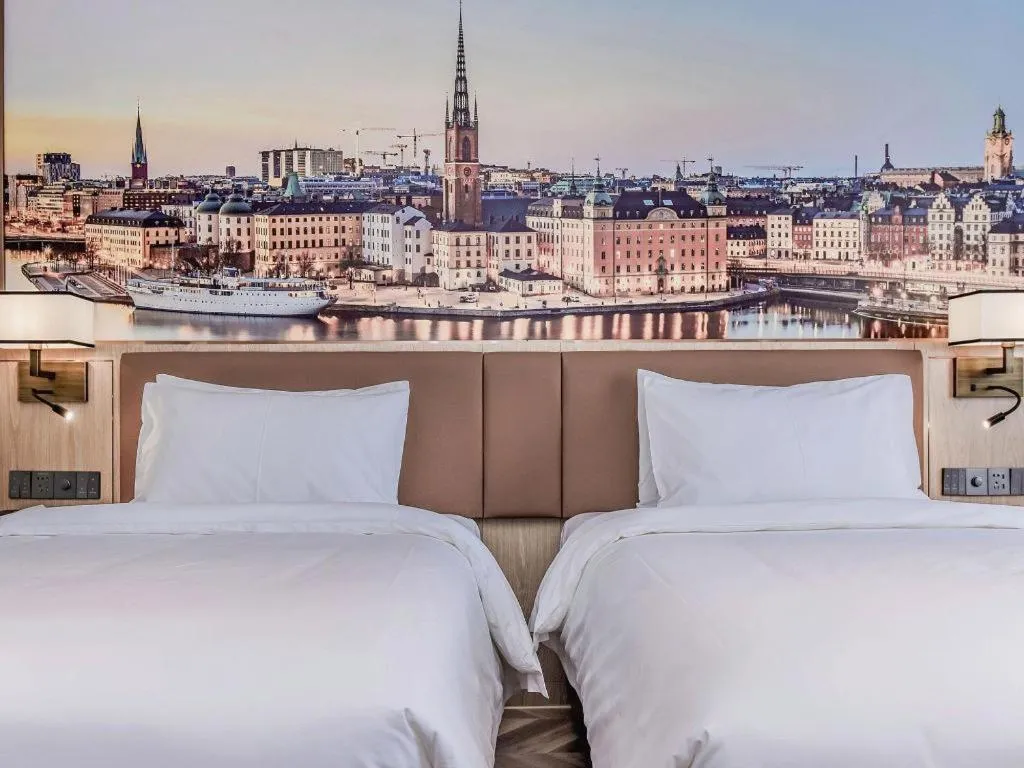 Bed in Vienna Hotel Sichuan Hejiang Yangtze River Bridge