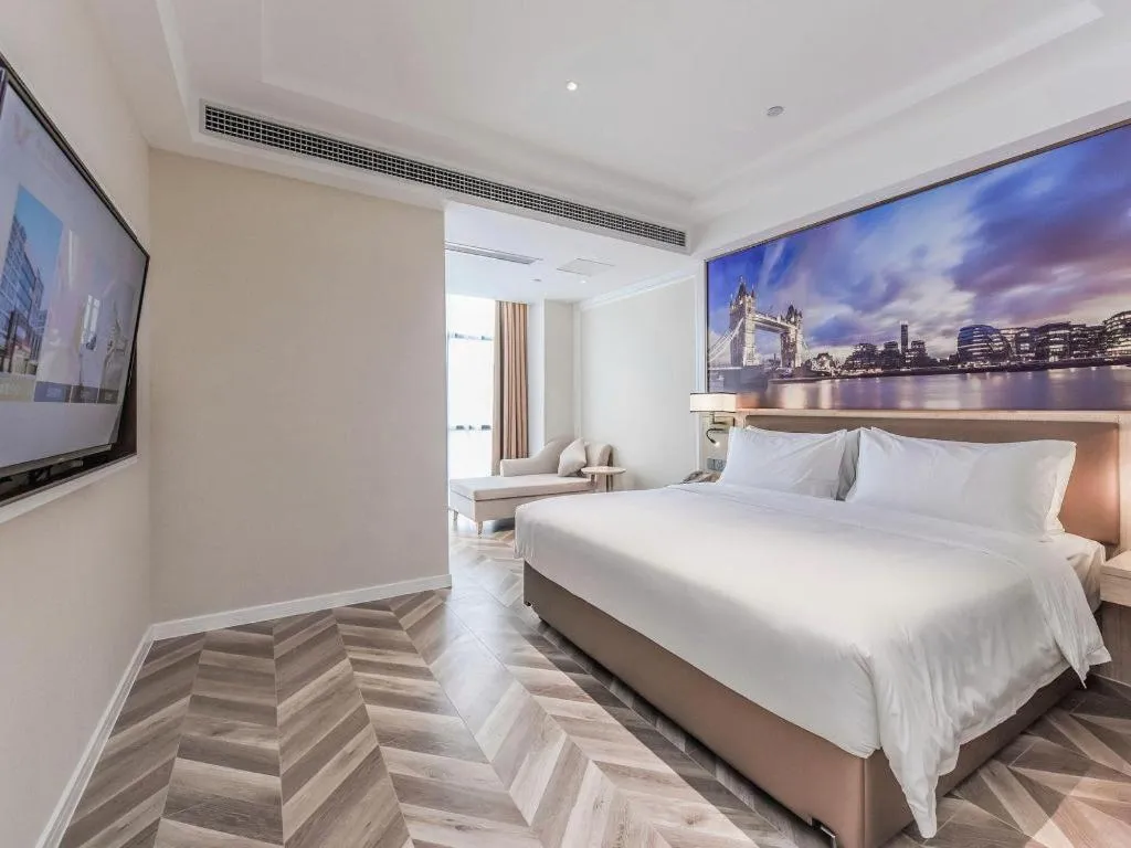 Bed in Vienna Hotel Sichuan Hejiang Yangtze River Bridge