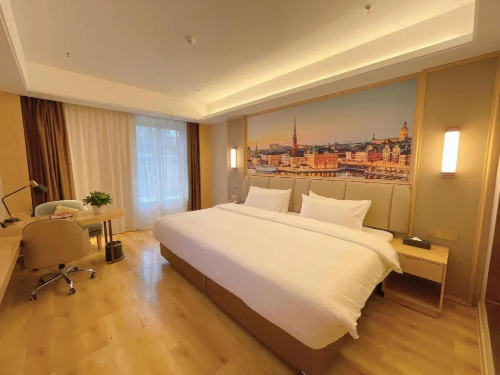Bed in Vienna Hotel Sichuan Hejiang Yangtze River Bridge