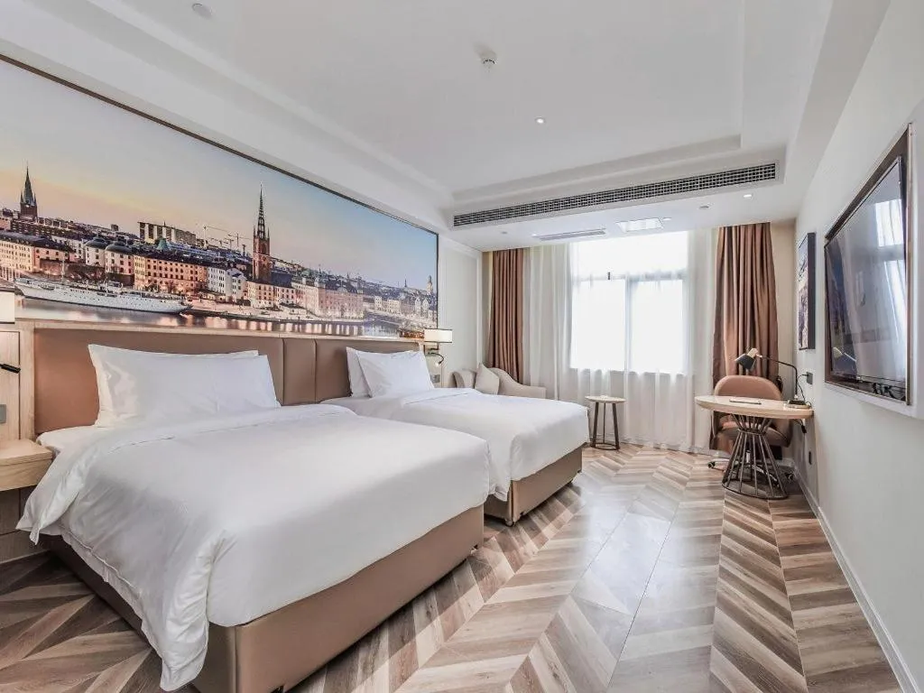 Bed in Vienna Hotel Sichuan Hejiang Yangtze River Bridge