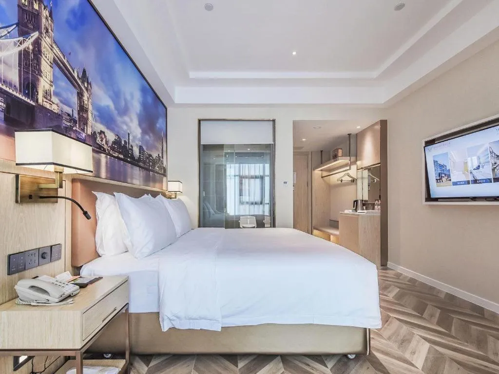 Bed in Vienna Hotel Sichuan Hejiang Yangtze River Bridge