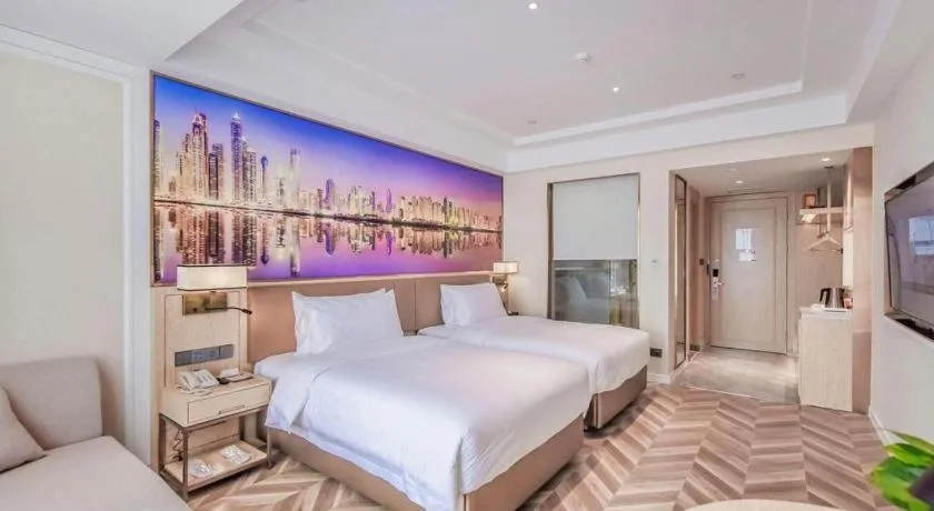 Bed in Vienna Hotel Sichuan Hejiang Yangtze River Bridge