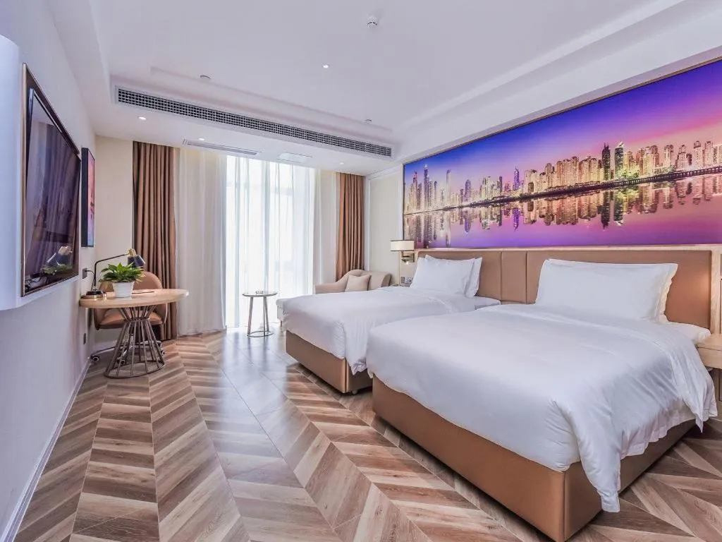 Bed in Vienna Hotel Sichuan Hejiang Yangtze River Bridge