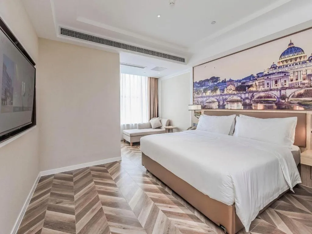 Bed in Vienna Hotel Sichuan Hejiang Yangtze River Bridge