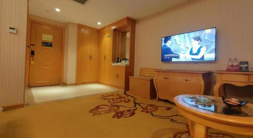 Bed in Vienna Hotel Guangxi Beiliu Passenger Station