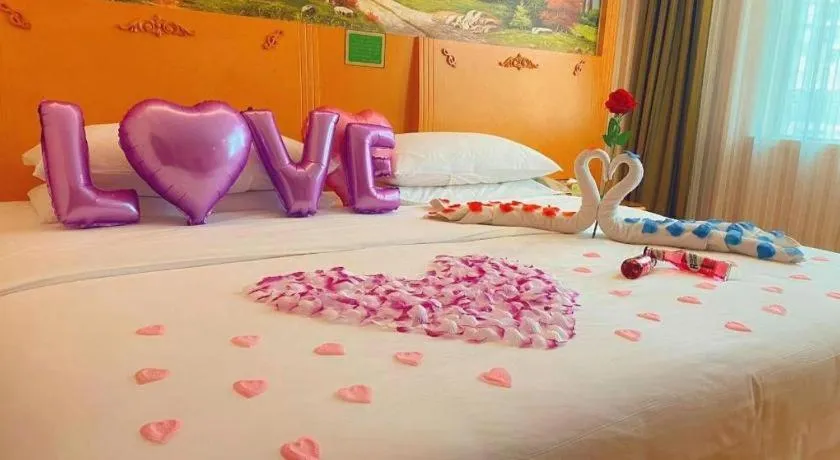 Bed in Vienna Hotel Guangxi Beiliu Passenger Station