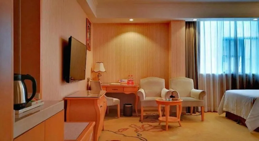 Bed in Vienna Hotel Guangxi Beiliu Passenger Station