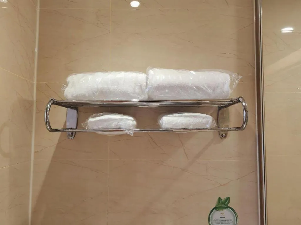 Bed in Vienna Hotel Guangxi Beiliu Passenger Station